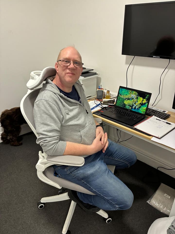 James Parker sitting at his desk